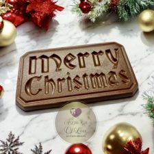 A chunky chocolate bar saying Merry Christmas